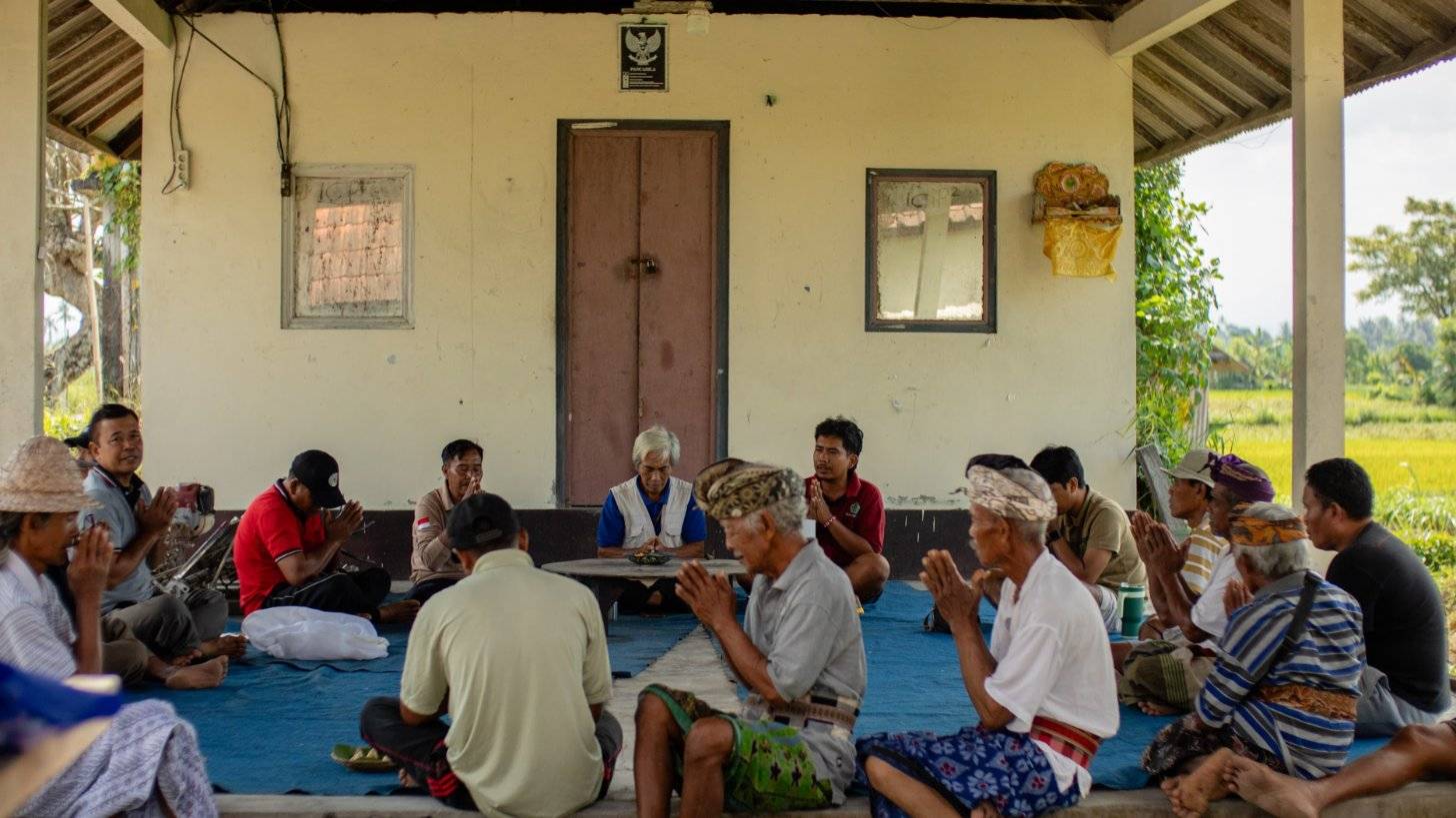 Farmers gathered in a circle for a Capacity Building session
