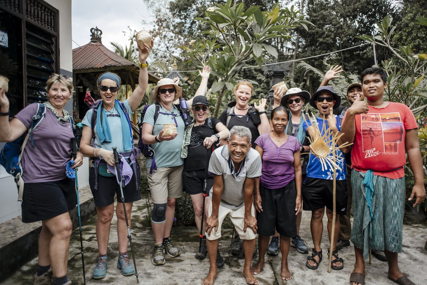 Pilgrims and their village hosts cheering together